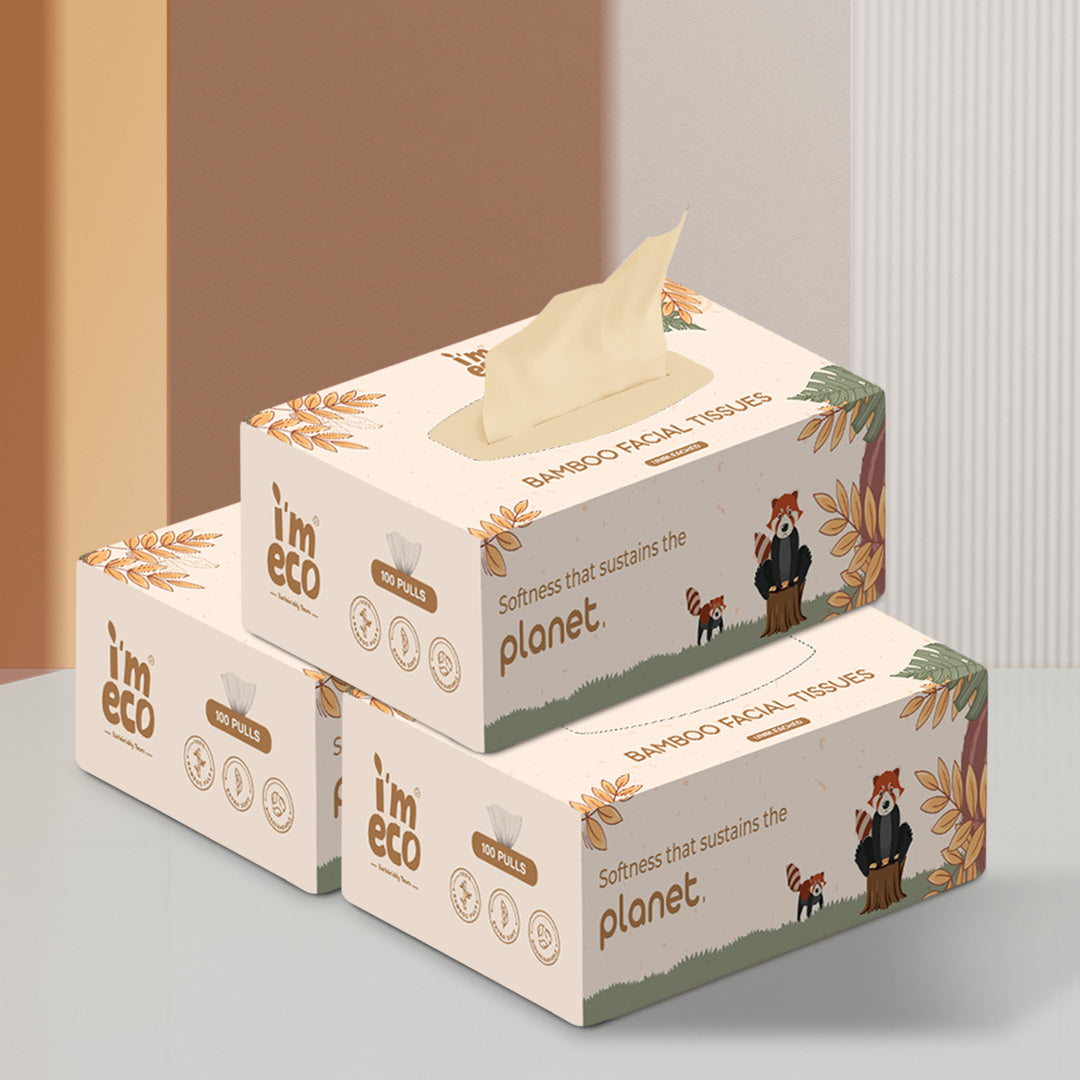 3 boxes of bamboo facial tissues with one pull out visible from the top box.