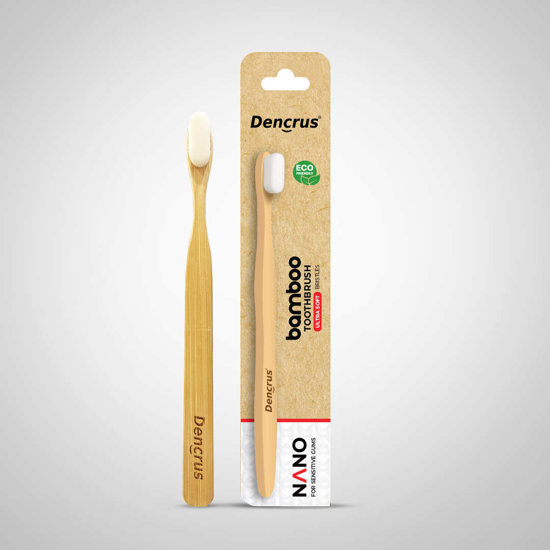 A Dencrus NANO Toothbrush with the packaging placed against a white background.