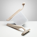 2 Shaveco bamboo husk razors with 3 blade precision is placed on white background.