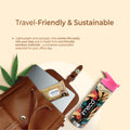 travel-friendly and sustainable bamboo products combo with a brown bag, pink water bottle, and other items on a beige background.