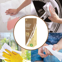 Reusable bamboo towels being used for cleaning various surfaces, with a box of reusable bamboo towels in the center.