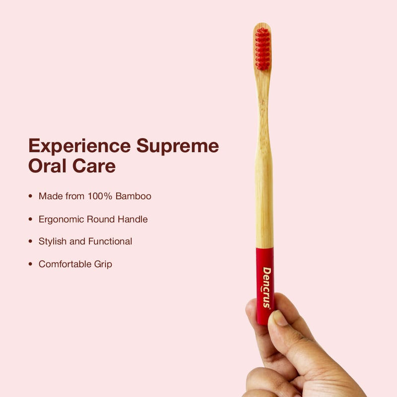 A human hand is holding Dencrus RED ORBY Plus toothbrush against a white light background. And the features are mentioned in the background
