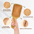 IMECO bamboo hairbrush with bamboo bristles and handle, held by a hand, on a white background with product features highlighted.